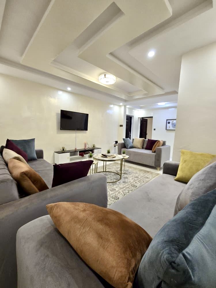 Salon de l’appartement 1 chambre FIDYA Homes